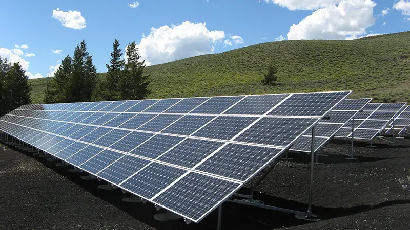 solar panels in a field - green energy