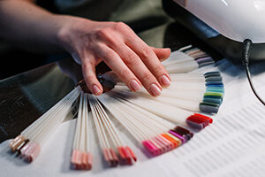 Person holding white printer paper