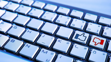 Keyboard with thumbs up and thumbs down keys