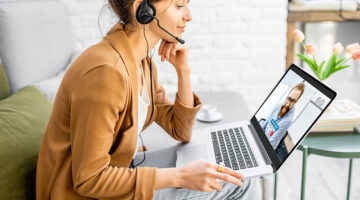 Business woman having a video call with coworker