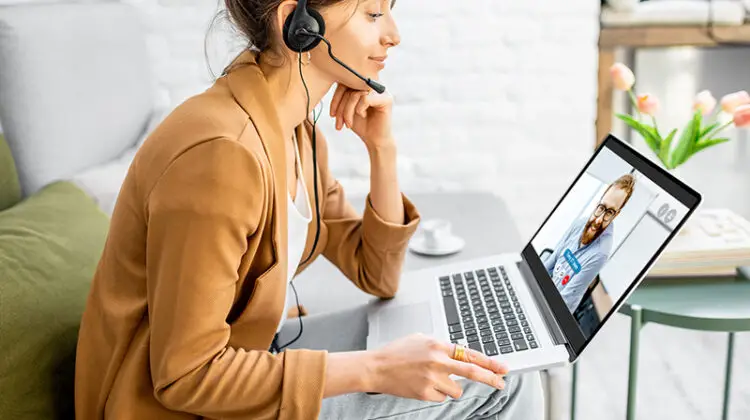 Business woman having a video call with coworker