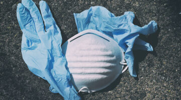 Gloves and mask on the ground