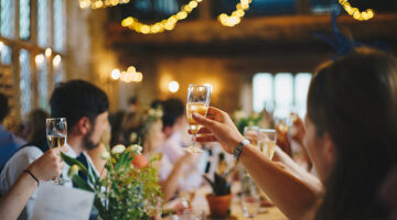 People raising wine glass