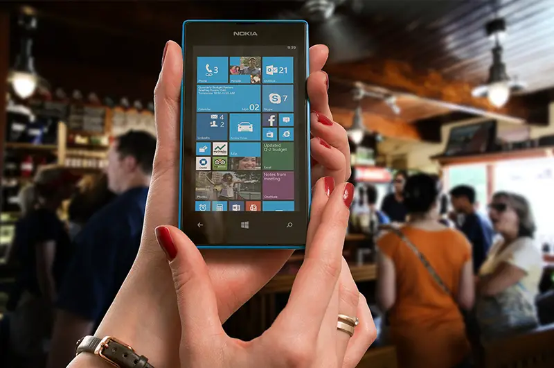 Woman holding Nokia Lumia Microsoft