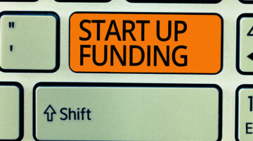 Writing note showing Start Up Funding.