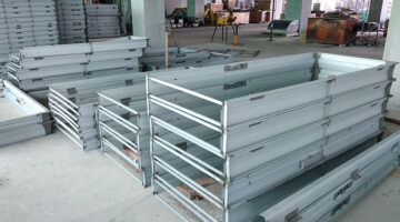 Mild Steel Door Frame stacked horizontally at the construction site.