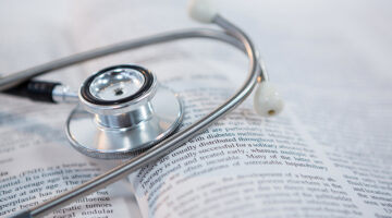 Stethoscope on open book