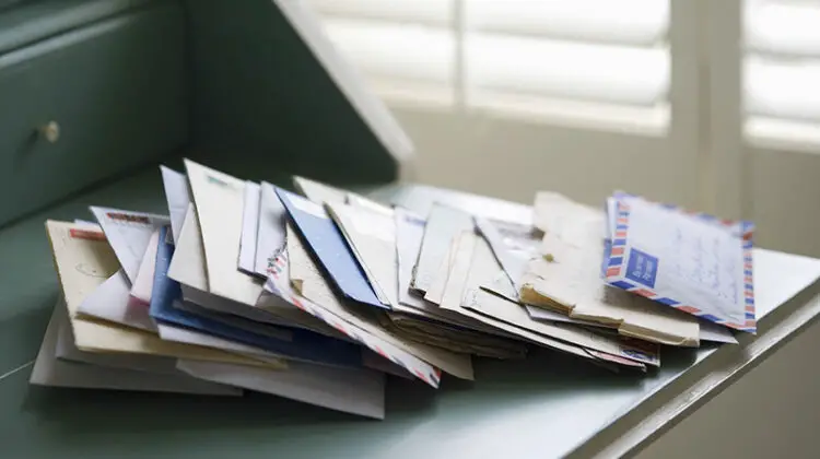 Closeup of letters on writing desk at home