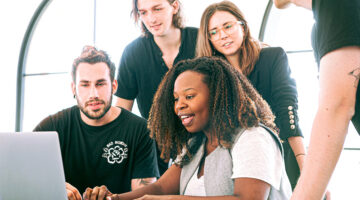 Woman sharing her presentation with her colleagues