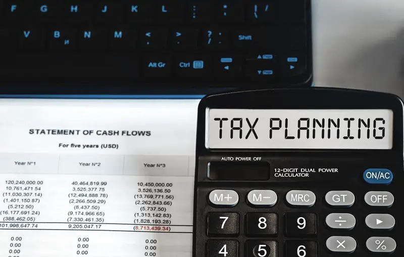 TAX PLANNING - concept of text on calculator display