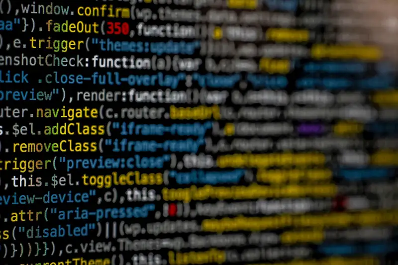 programming codes on black background