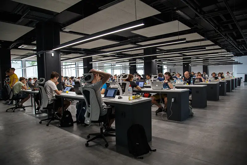employees working in open plan office