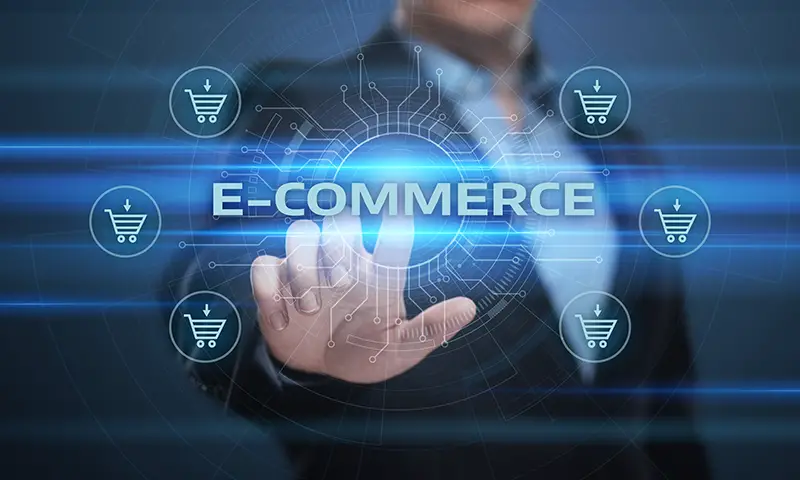 Business man pointing at ecommerce button