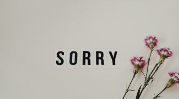 Sorry text near flowers