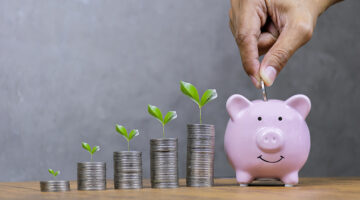 Pink piggy bank savings concept
