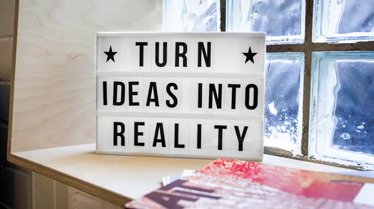 Black and white quote on frame near the window