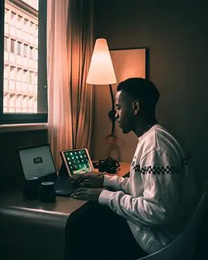 Man using laptop inside the room
