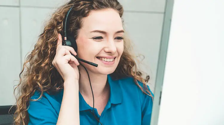 Business people wearing headset working in office