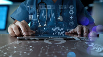 Medicine doctor hand working with modern computer interface as medical network concept