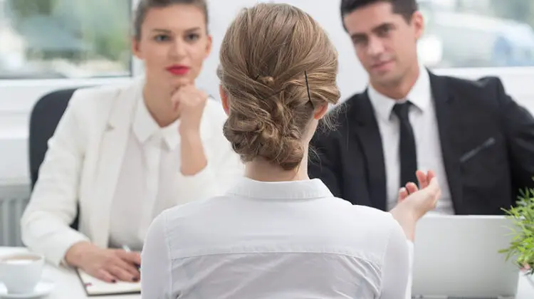 Young woman and recruitment procedure in corporation