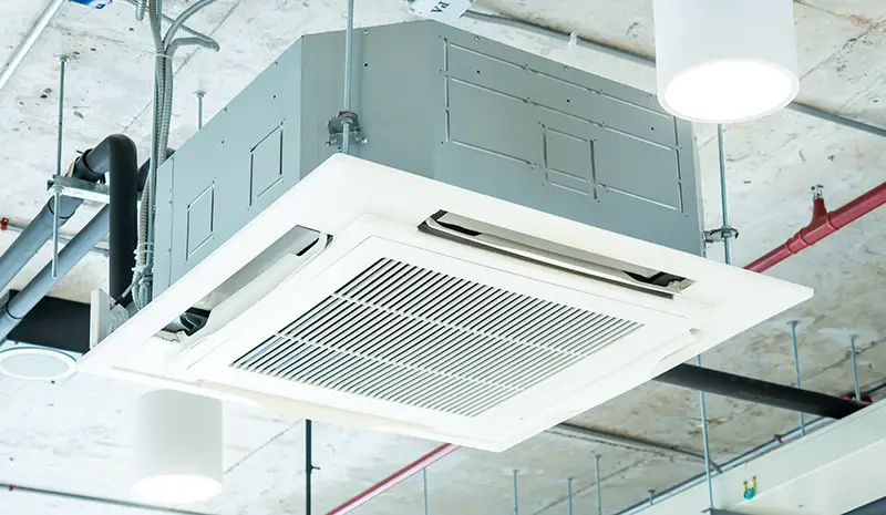 Modern ceiling air conditioning system in loft office