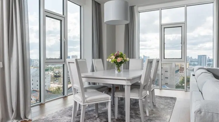 Dining room with acrylic dining chairs