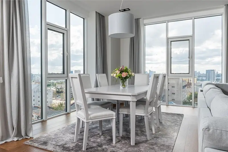 Dining room with acrylic dining chairs