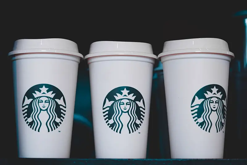 Three starbucks disposable cups
