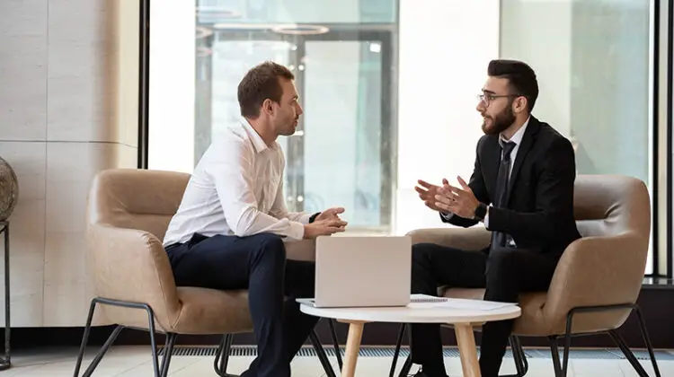 Businessman talking to business consultant expert