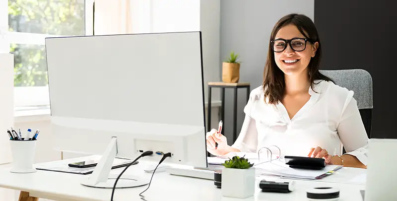 Smiling woman working as accountant