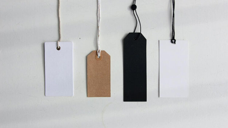Four paper card tags