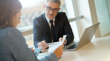 Financial consultant talking to his female client