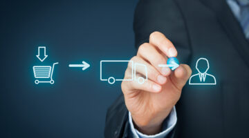 Businessman draw an icons on virtual screen