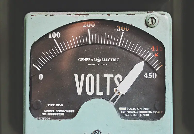 gray GE volt meter