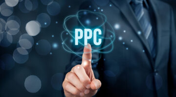 Businessman pointing on virtual screen PPC concept