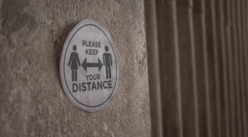 social distancing signage on the wall