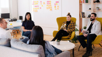 people having meeting in a living room