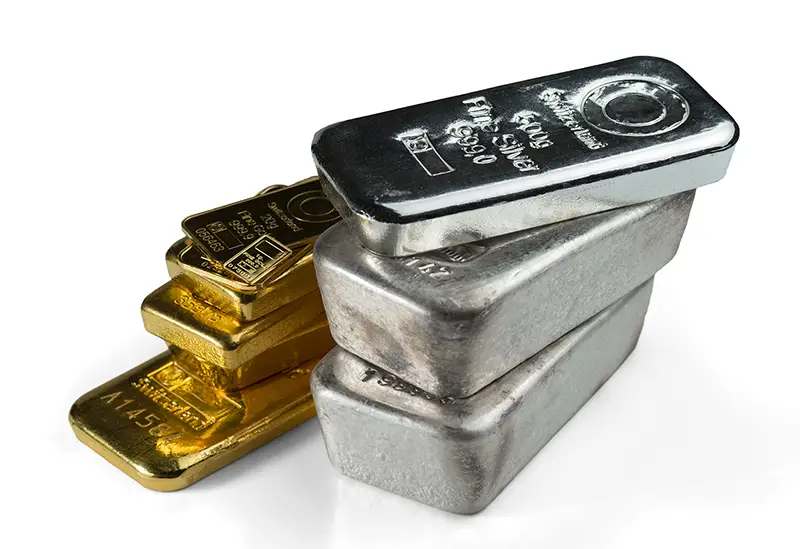 A pile of gold and silver bars.