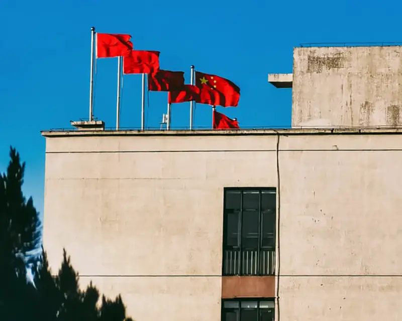 Red flag on the top of the buildng