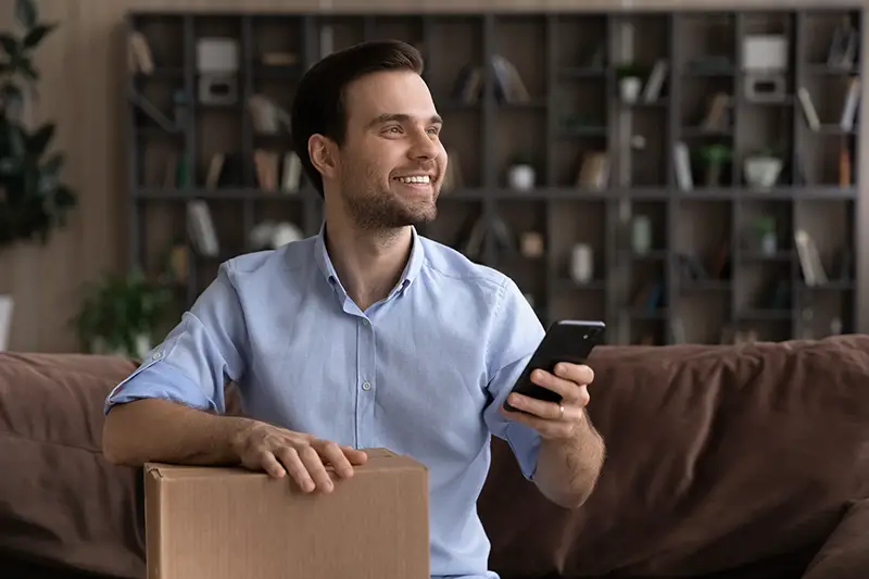 young male client give positive feedback to package tracking app