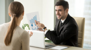 project manager holds financial report