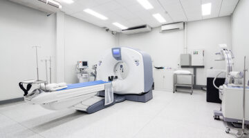 computed axial tomography scan machine in hospital room