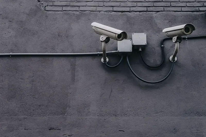 CCTV camera on concrete wall