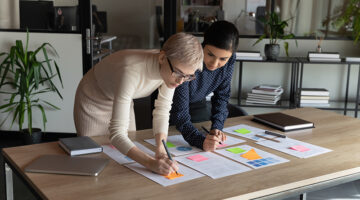 Two women working together in a project