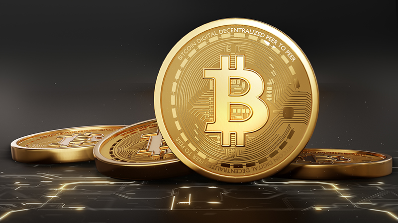 close up of Bitcoin coins isolated on black background