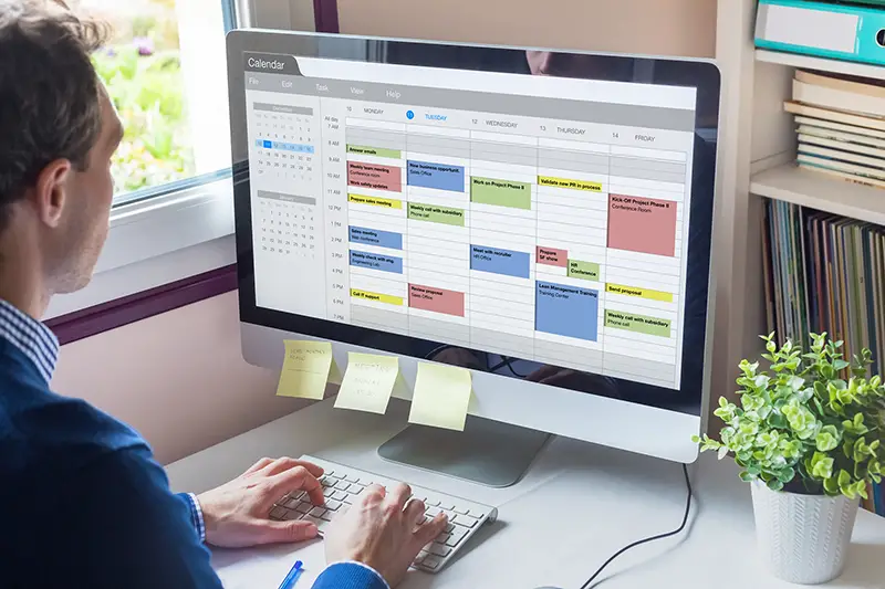 Calendar software showing busy schedule of manager
