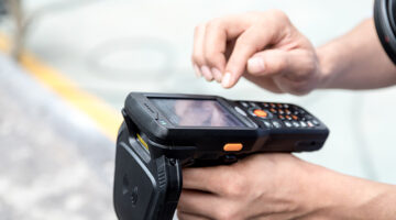 Person using handheld terminal