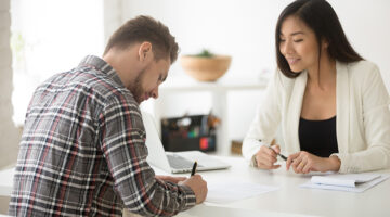 businessman signing contract for business loan