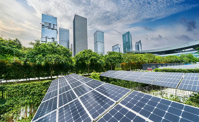 Ecological energy renewable solar panel plant with urban modern building landscape