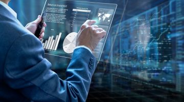 Businessman holding a modern tablet touch screen